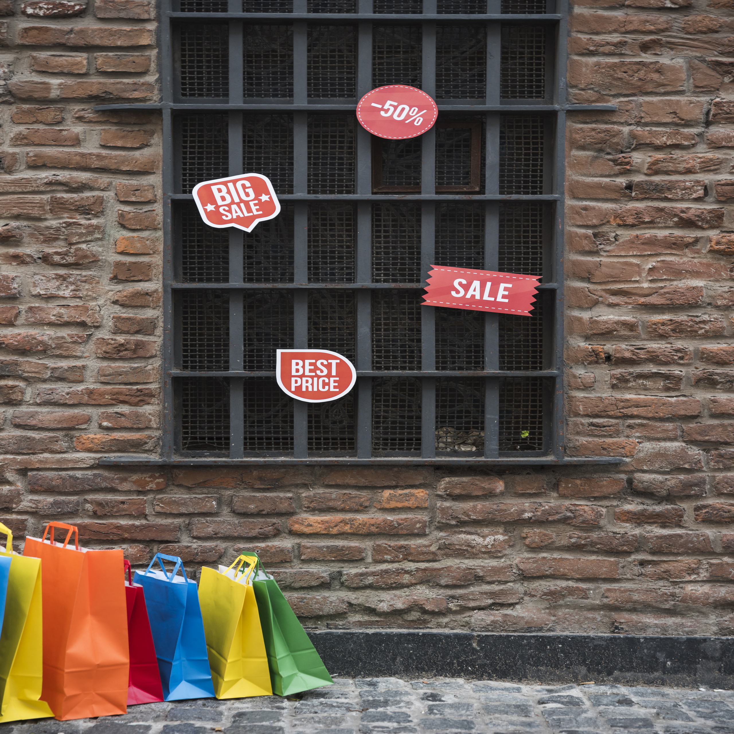 shopping-bags-sale-tablets-near-window-brick-wall_2560x2560